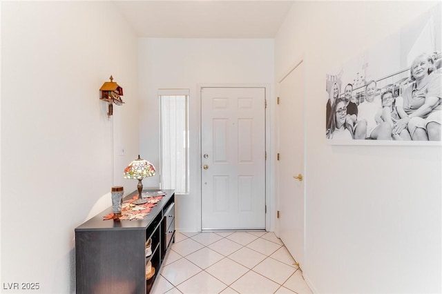 foyer with light tile patterned floors