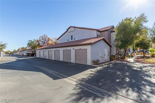 view of home's exterior with a garage