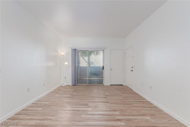 empty room with light wood-type flooring