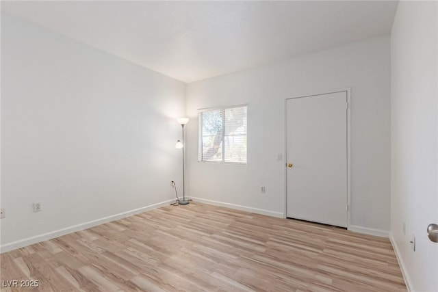 empty room featuring light hardwood / wood-style floors