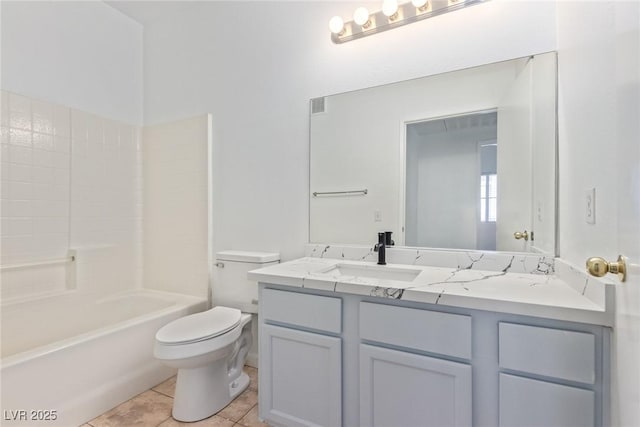 full bathroom with tile patterned flooring, vanity, shower / tub combination, and toilet