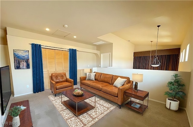 carpeted living room with baseboards, visible vents, and recessed lighting