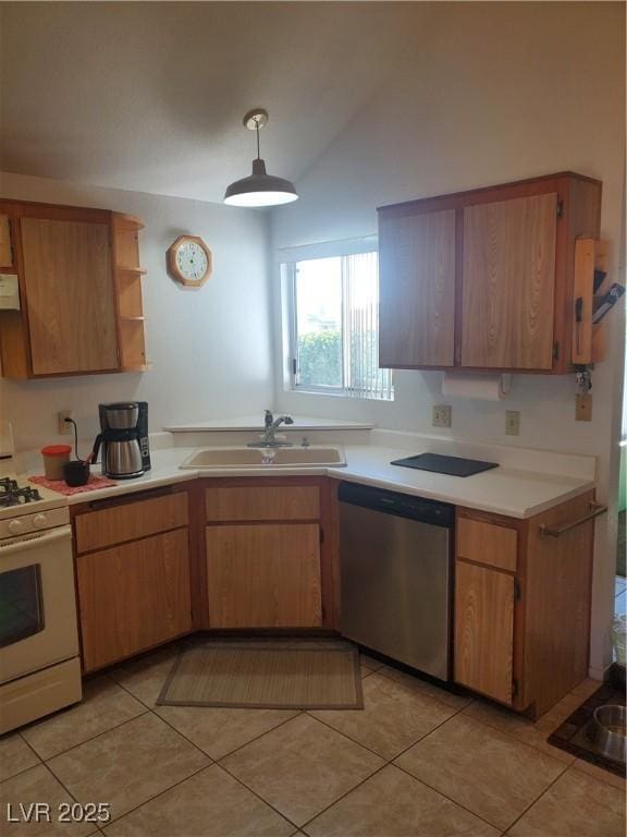 kitchen with vaulted ceiling, decorative light fixtures, dishwasher, sink, and white range with gas stovetop