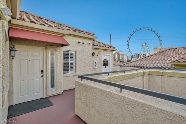 view of patio / terrace with a balcony