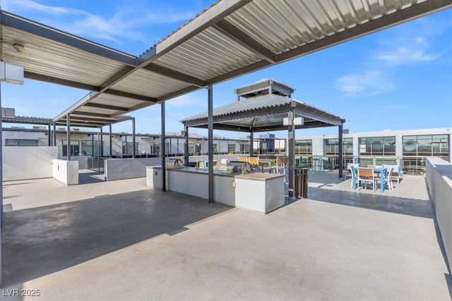 view of patio / terrace with a gazebo and exterior kitchen