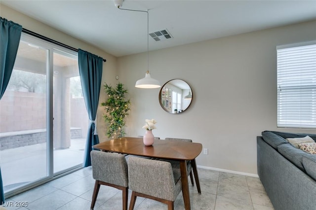 view of tiled dining space