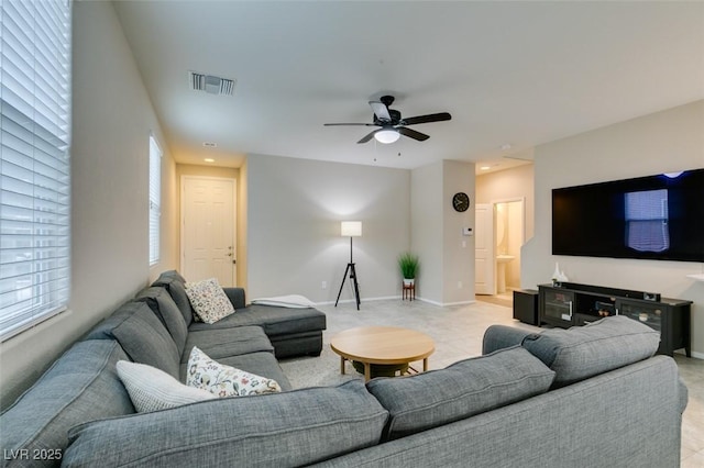 living room featuring ceiling fan