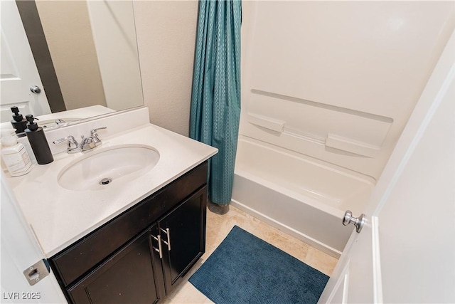 full bath featuring shower / bath combo and vanity