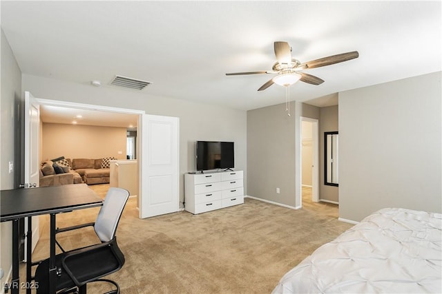 bedroom with light carpet, baseboards, visible vents, and ceiling fan