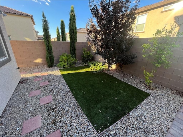 view of yard featuring a fenced backyard