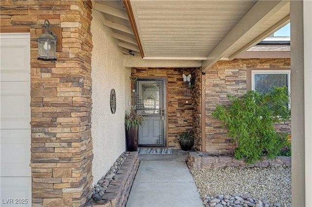 doorway to property featuring a garage