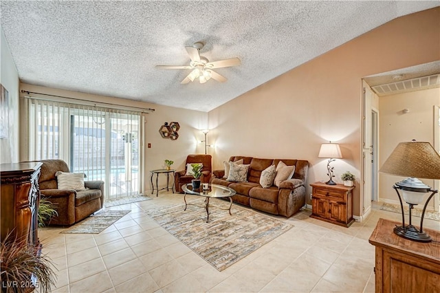 tiled living room featuring lofted ceiling, a textured ceiling, and ceiling fan