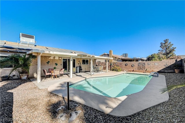 view of swimming pool featuring central AC and a patio area