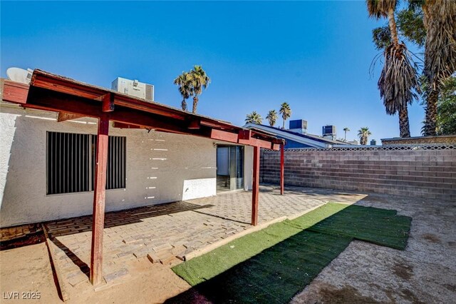 exterior space featuring central AC and a patio area