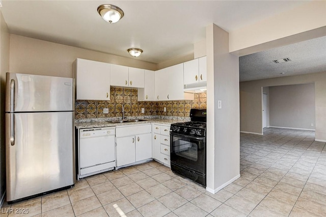 kitchen with sink, stainless steel refrigerator, white dishwasher, black gas range, and white cabinets