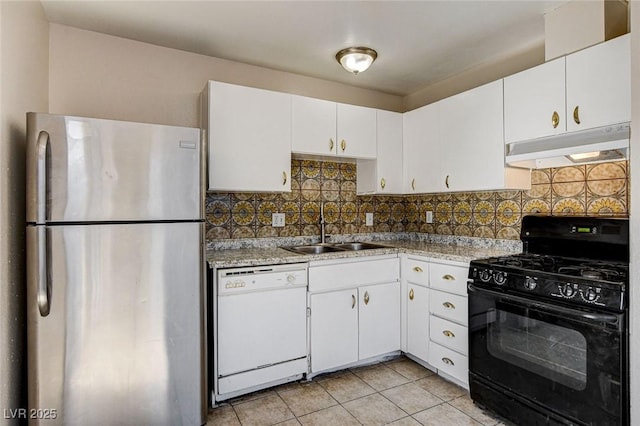 kitchen with sink, black gas range oven, stainless steel fridge, white dishwasher, and white cabinets