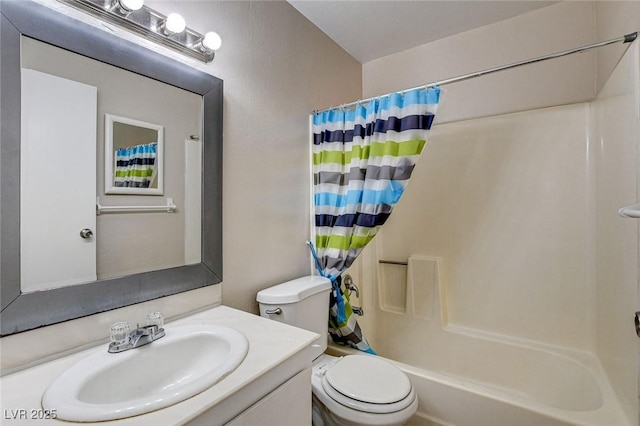 full bathroom with vanity, shower / bath combination with curtain, and toilet