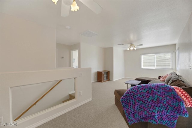 living room featuring light colored carpet and ceiling fan