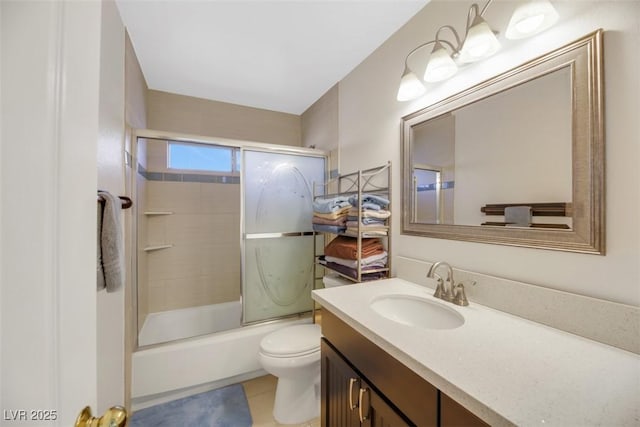 full bathroom with vanity, tile patterned floors, shower / bath combination with glass door, and toilet