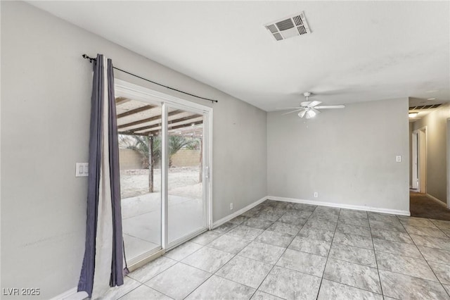 unfurnished room featuring light tile patterned floors and ceiling fan