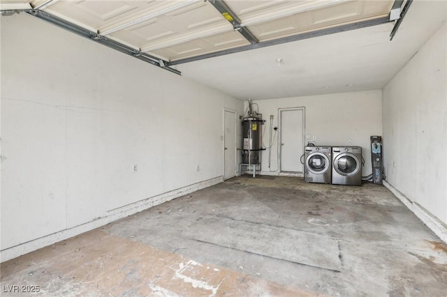 garage with secured water heater and washing machine and dryer