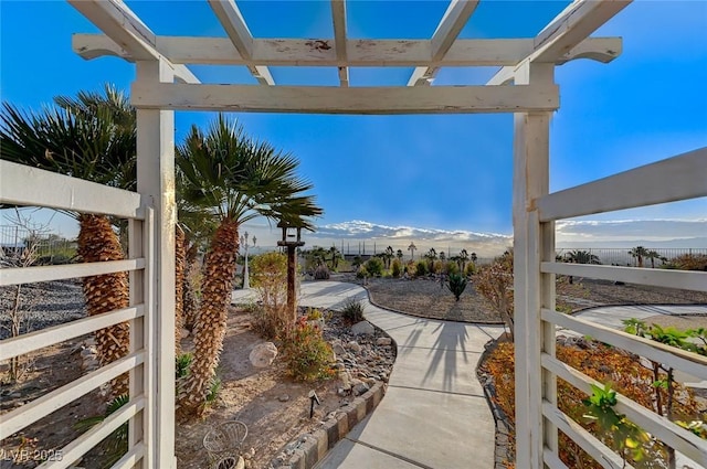 view of patio / terrace featuring a mountain view