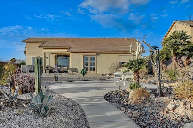 view of front of home with a patio