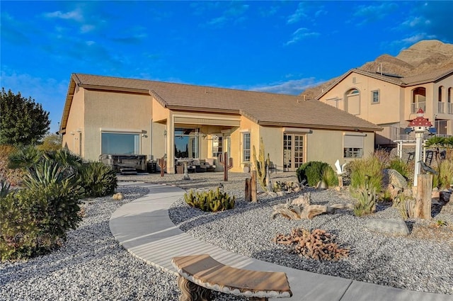 rear view of property with a patio