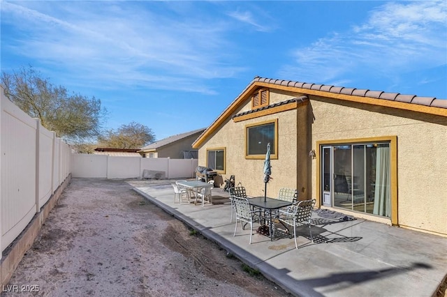 rear view of house with a patio area