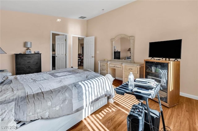 bedroom featuring light hardwood / wood-style floors