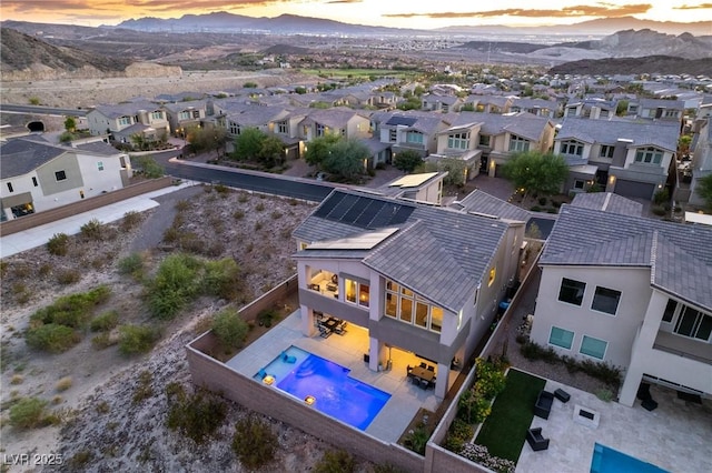 aerial view at dusk with a mountain view