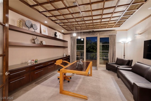 home office featuring light colored carpet, coffered ceiling, ornamental molding, and built in desk