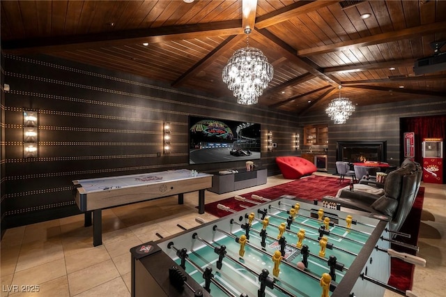 game room with tile patterned flooring, an inviting chandelier, lofted ceiling with beams, and wood ceiling