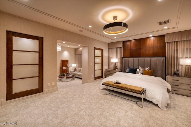 bedroom with light carpet, visible vents, recessed lighting, and a raised ceiling