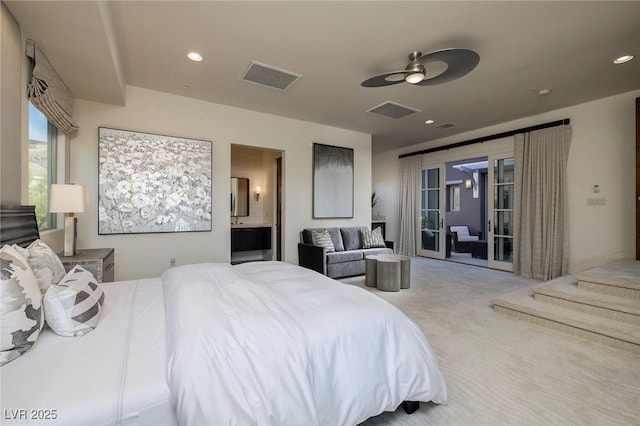 bedroom with visible vents, carpet floors, ensuite bath, recessed lighting, and access to exterior