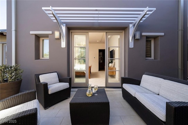 view of patio featuring an outdoor hangout area and a pergola