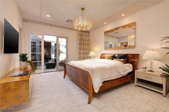 bedroom with recessed lighting, visible vents, a raised ceiling, and access to exterior