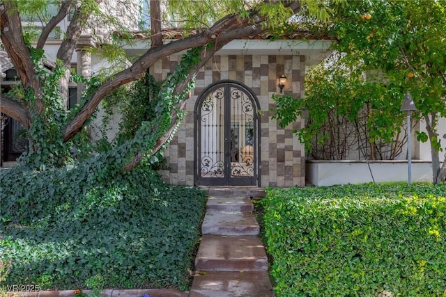 view of gate featuring french doors