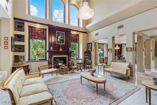 interior space with a wealth of natural light and a notable chandelier