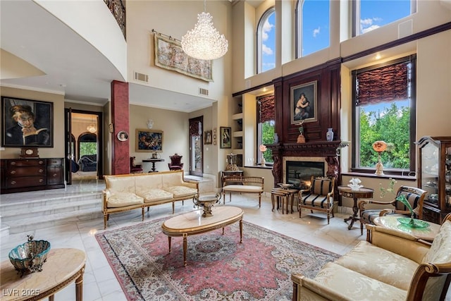 interior space with a notable chandelier and crown molding