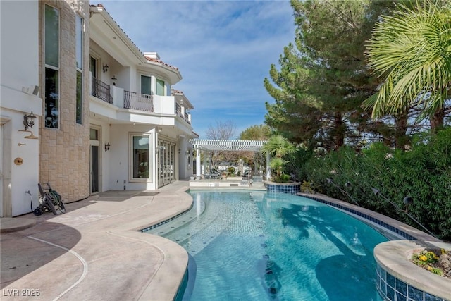 view of pool featuring a patio and a pergola