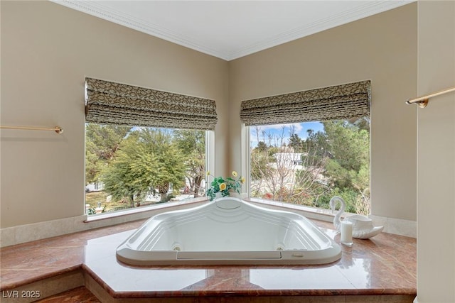 bathroom with a relaxing tiled tub and ornamental molding