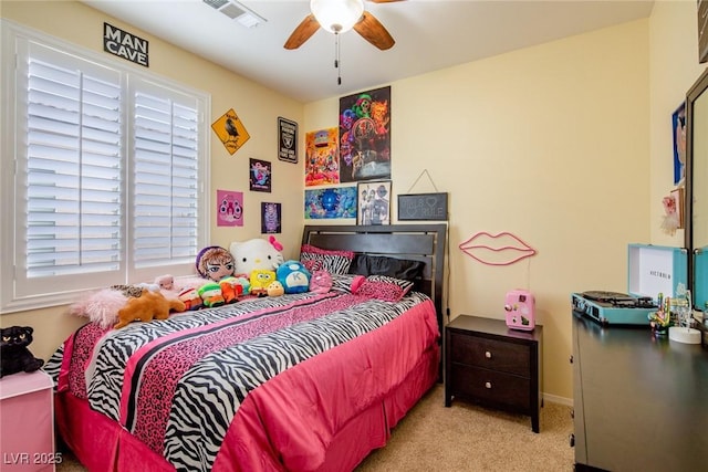 carpeted bedroom featuring ceiling fan