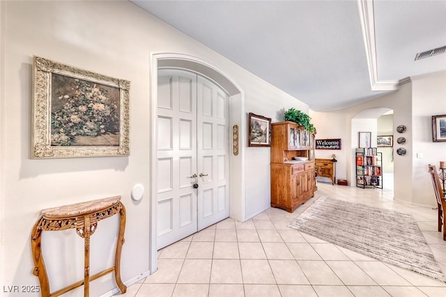 view of tiled foyer entrance