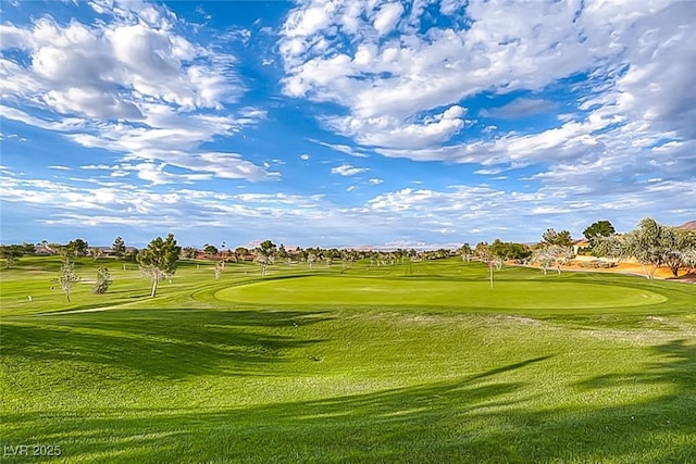 view of property's community featuring a yard