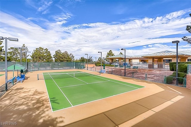 view of tennis court featuring basketball court