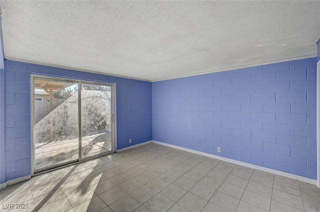 empty room featuring a textured ceiling