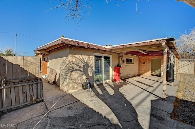 rear view of property with a patio