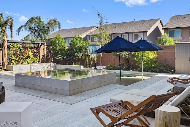 view of home's community with a patio