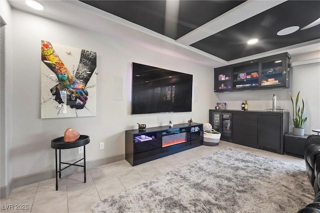 living room with bar and tile patterned floors